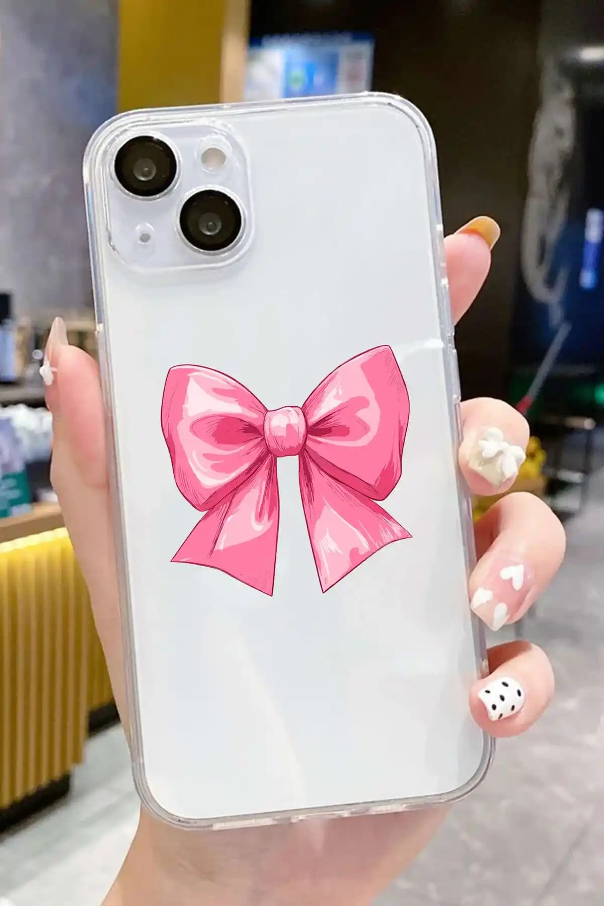 iPhone 15 için estetik ve fonksiyonel fiyonk desenli uyumlu kılıf seçenekleri