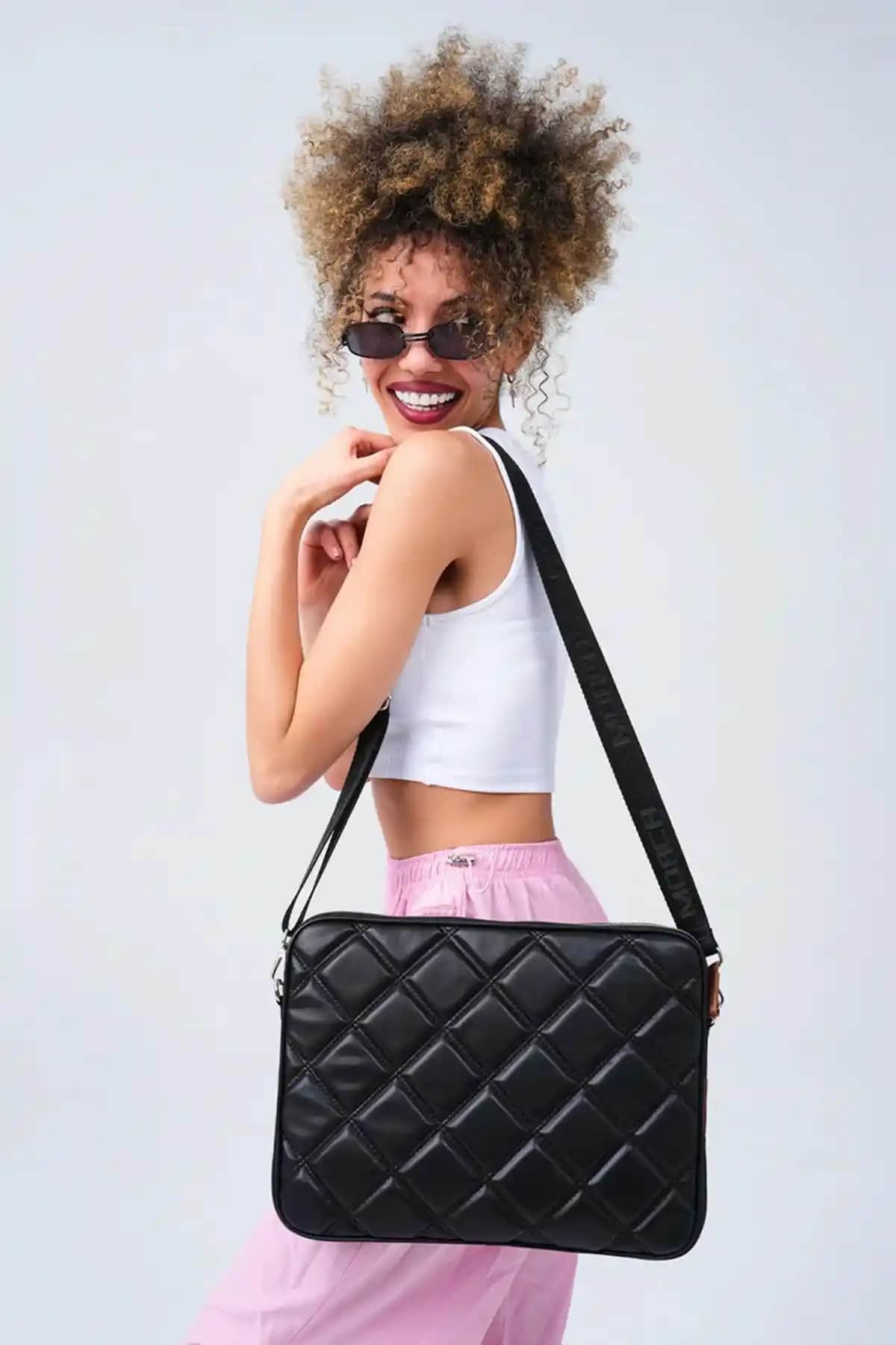 MORCA Kapitone Laptop Kılıfı 15-16 İnç Siyah ve Mint Modellerinin Karşılaştırması