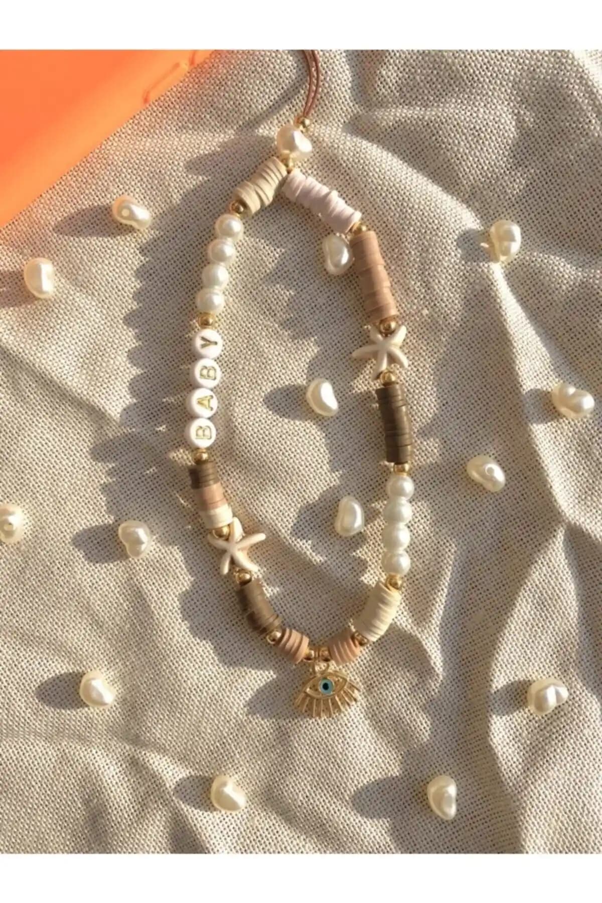 Moshi Design Fimo Boncuk Telefonn Askısı: Apple Uyumlu Şık ve Dayanıklı Aksesuar